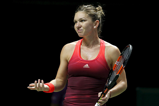 Simona Halep of Romania reacts after losing a point 