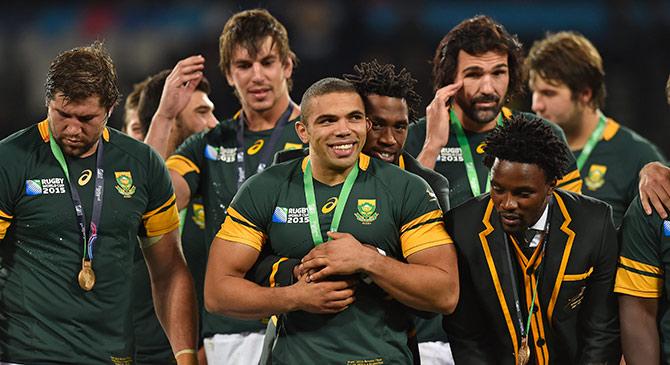 South Africa's Bryan Habana celebrates with team mate Siya Kolisi 