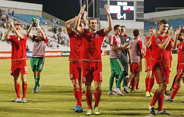 Wales' Gareth Bale and teammates celebrate at the end of the match against Cyprus at GSP Stadium, Nicosia, in Cyprus