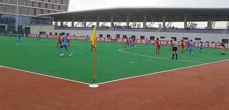 Action in the match between India and South Korea on Saturday