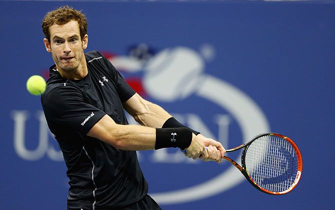 Great Britain's Andy Murray plays a backhand against Brazil's Thomaz Bellucci