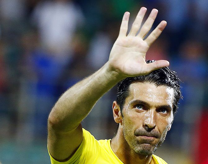 Italy's goalkeeper Gianluigi Buffon waves to the crowd at the end of the match, his 150th appearance for the national team