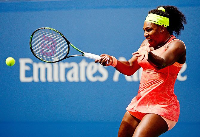 Serena Williams plays a forehand return against Roberta Vinci