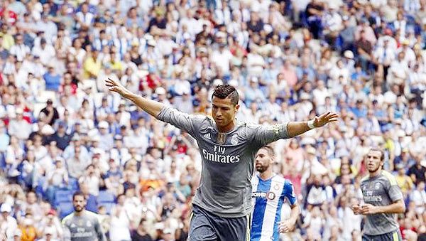 Real Madrid's Cristiano Ronaldo celebrates a goal against Espanyol during their La Liga match in Cornella, near Barcelona, on Saturday
