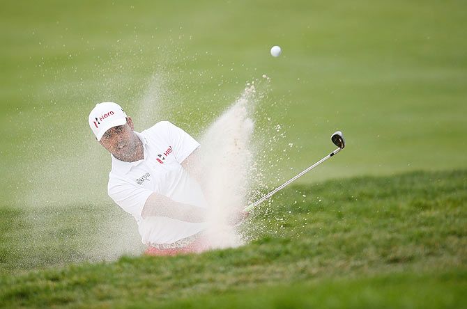 India's Anirban Lahiri hits from a green side sand trap on the fifth hole during the final round of the Web.com Tour Hotel Fitness Championship at Sycamore Hills Golf Club in Fort Wayne, Indiana, on Sunday