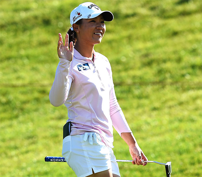Lydia Ko of New Zealand celebrates winning on the 18th hole 