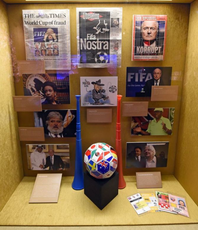 Media clippings and other items are shown during the unveiling of 'The 'Beautiful Game' Turns Ugly' 