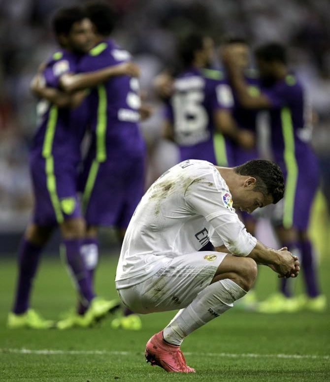 Cristiano Ronaldo looks dejected after the La Liga match against Malaga at the Santiago Bernabeu on Saturday, September 25