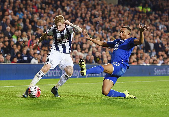 West Bromwich Albion's James McClean is blocked by Everton's Brendan Galloway