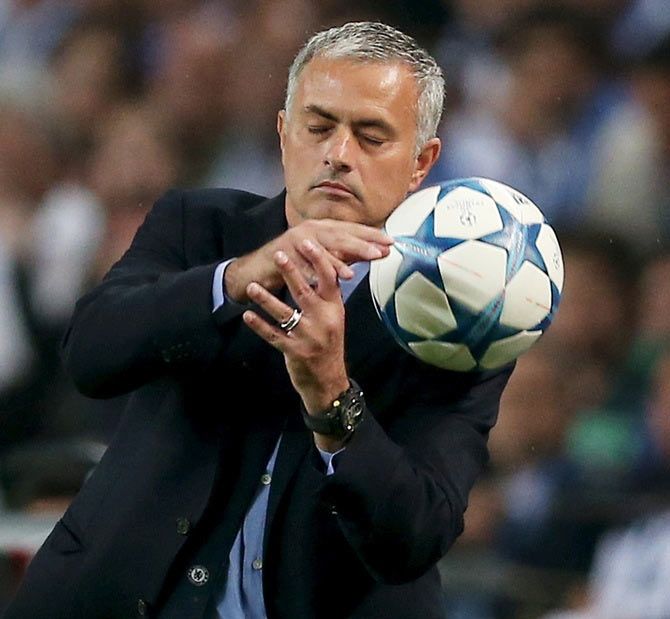 Jose Mourinho dodges a ball