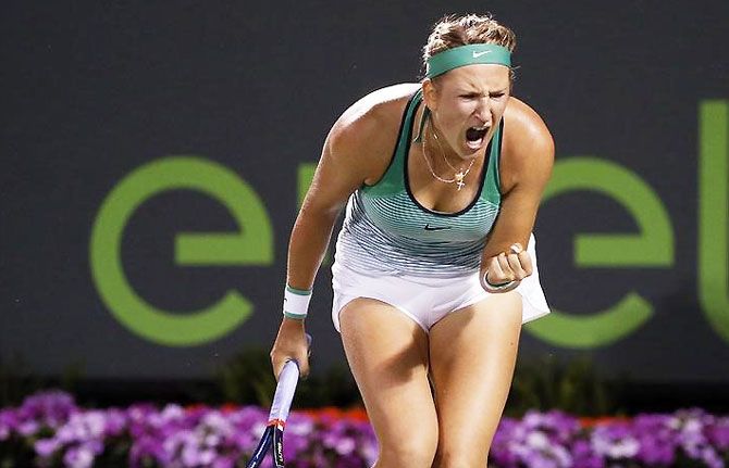 Belarus' Victoria Azarenka celebrates after winning a point against Germany's Angelique Kerber during their women's singles semi-final at the Miami Open at Crandon Park Tennis Center in Key Biscayne, Florida, on Thursday