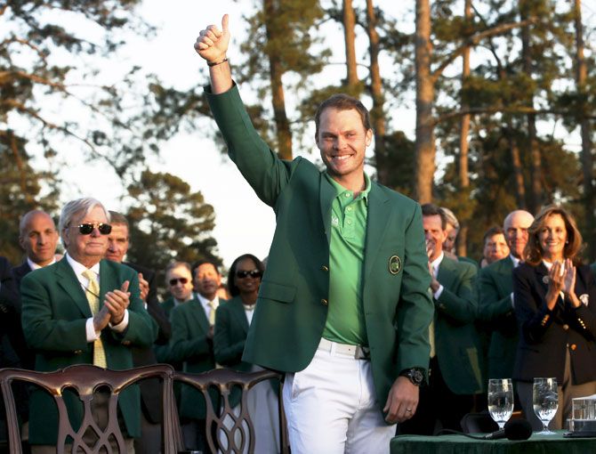 Danny Willett celebrates in the green jacket after winning the 2016 The Masters golf tournament at Augusta National Golf Club in Augusta, Georgia, on Sunday