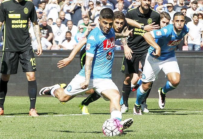 Napoli's Lorenzo Insigne shoots and scores a penalty