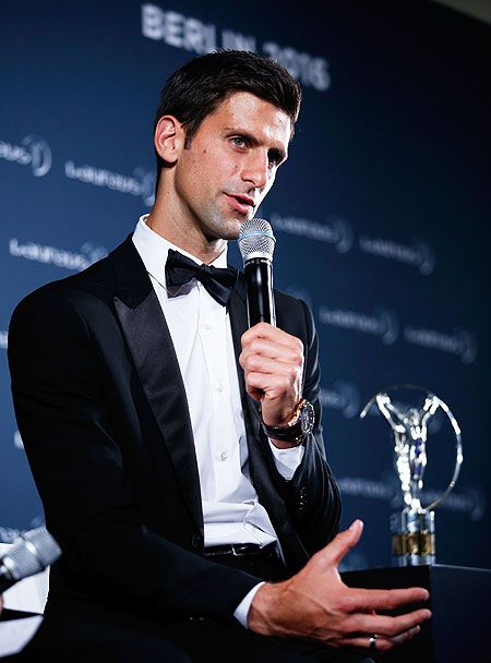 Novak Djokovic speaks at a press briefing after accepting his award