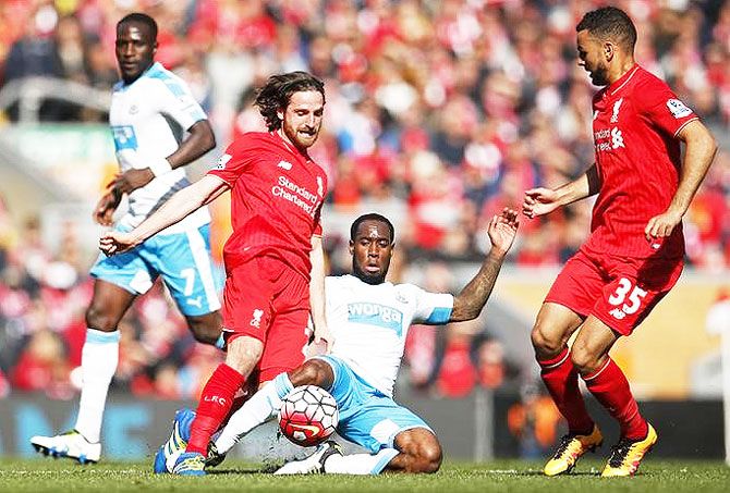 Liverpool's Joe Allen in action against Newcastle's Vurnon Anita during their match at Anfield on Saturday