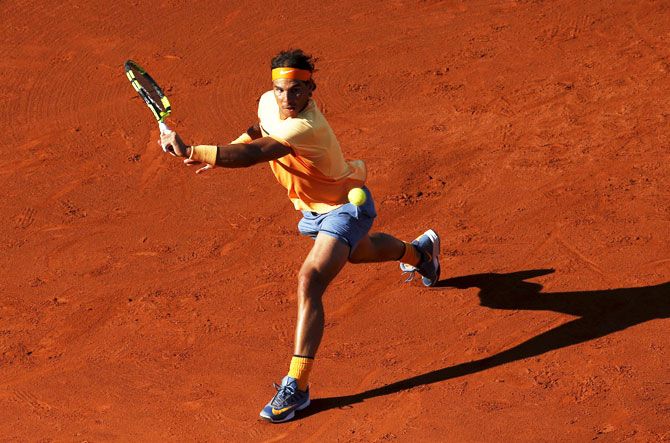 Spain's Rafael Nadal returns a ball to Japan's Kei Nishikori during the Barcelona Open tennis tournament final on Sunday