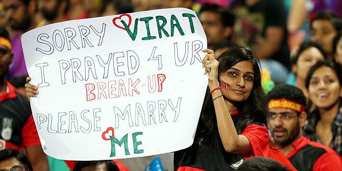 A fan of Virat Kohli makes her feelings known during an Indian Premier League match between the Royal Challengers Bangalore and the Pune Supergiants at the Maharashtra Cricket Association's International Stadium, Pune on Friday, April 22