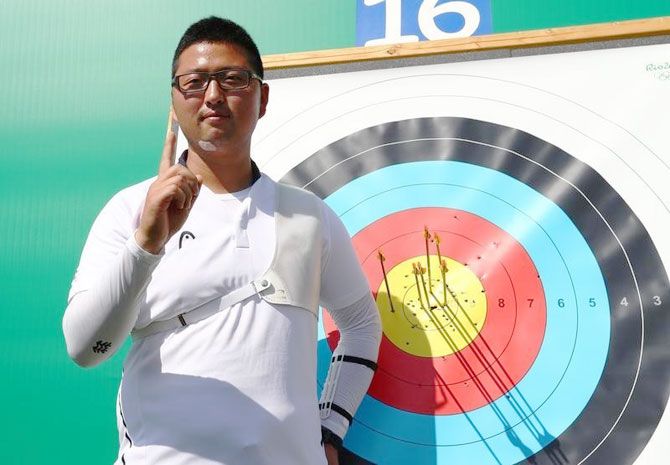 Kim Woo-Jin (KOR) of South Korea gestures after his world record at the Rio Olympics on Friday