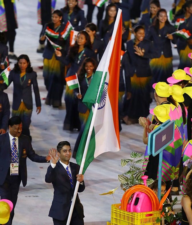 Beijing Olympics gold medalist Abhinav Bindra leads the Indian contingent at the Parade of Nations during the Opening Ceremony of the Rio Olympics at Maracana Stadium on August 5