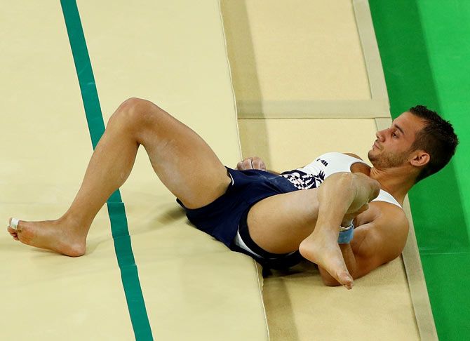  Samir Ait Said of France breaks his leg while competing on the vault during the Artistic Gymnastics Men's Team qualification at the Rio 2016 Olympic Games on August 6