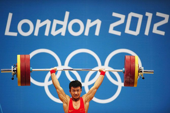 Jingbiao Wu of China competes in the Men's 56kg Weightlifting at the London 2012 Olympic Games