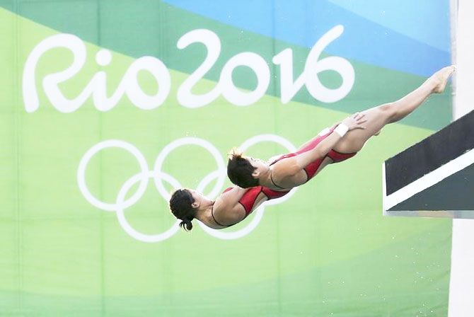 China's Chen Ruolin Liu Huixia compete in the Women's Synchronised 10m Platform Diving final at the Maria Lenk Aquatics Centre on Tuesday