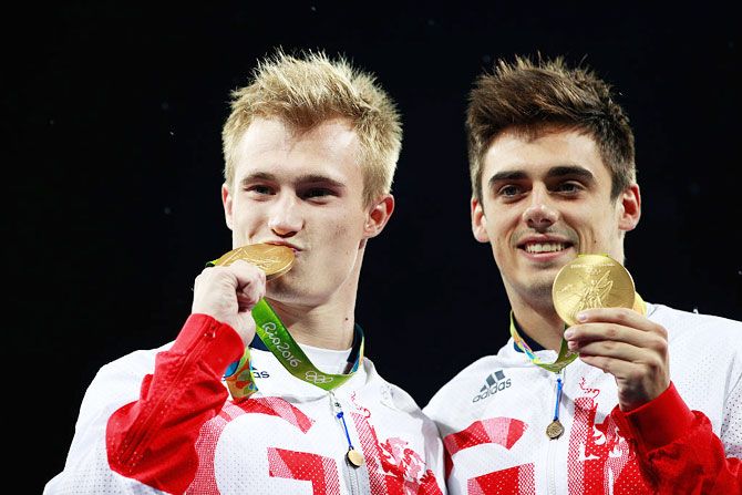 Gold medalists Jack Laugher and Chris Mears of Great Britain pose during the medal ceremony for the Men's Diving Synchronised 3m Springboard Final at Maria Lenk Aquatics Centre in Rio de Janeiro on Wednesday