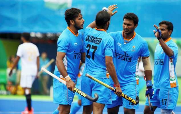 Akashdeep Singh of India (centre) celebrates with his teammates