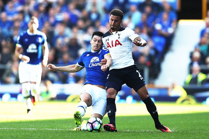 Gareth Barry of Everton battle for possession with Kyle Walker of Tottenham Hotspur during the Premier League match at Goodison Park in Liverpool on Saturday