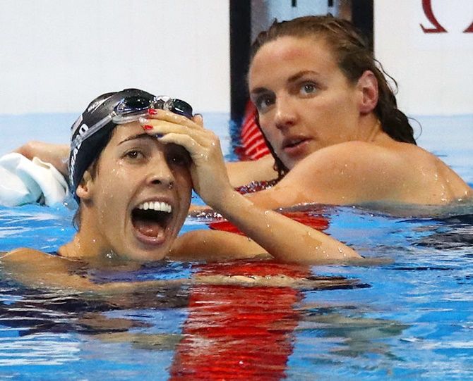Madeline DiRado, right, of the United States celebrates winning gold in the women's 200m backstroke final on Day 7