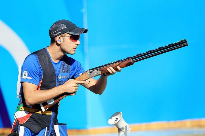Gabriele Rossetti of Italy competes in the skeet finals match on at the Olympic Shooting Centre on Saturday