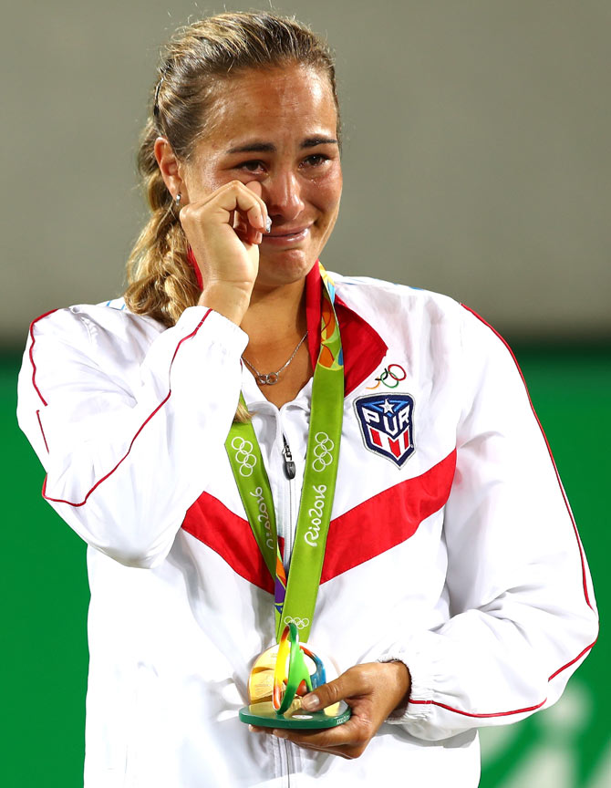 Puig wins Puerto Rico's first Olympic gold medal Sports