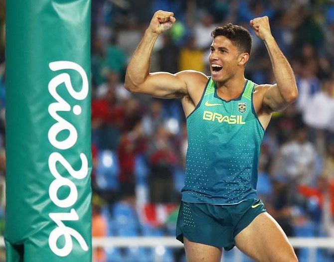 Thiago Braz da Silva of Brazil reacts after setting a new Olympic record on his way to winning the gold medal in the men's Pole Vault final on Monday