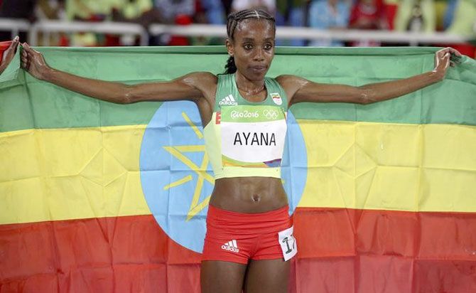 Almaz Ayana (ETH) of Ethiopia celebrates after winning bronze in the Women's 5000m Final on Friday