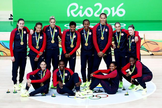 Gold medalists Team USA celebrate during the medal ceremony after the Women's Basketball competition at the Rio 2016 Olympic Games at Carioca Arena 1 in Rio de Janeiro on Saturday