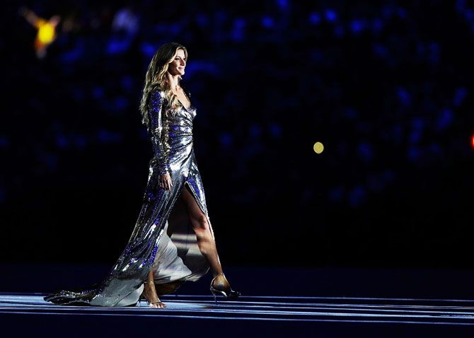 Brazilian supermodel Gisele Bundchen walks as The Girl From Ipanema during the Bossa segment of the Opening Ceremony of the Rio 2016 Olympic Games at Maracana Stadium at Rio de Janeiro on August 5