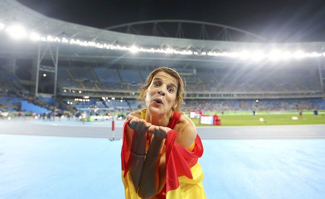 Ruth Beitia of Spain celebrates winning gold in the high jump on August 20
