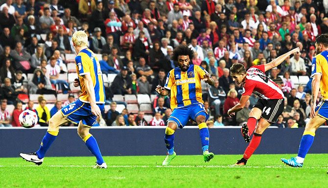 Adnan Januzaj of Sunderland scores the opening goal during the EFL Cup second round match between Sunderland and Shrewsbury Town at Stadium of Light on Wednesday