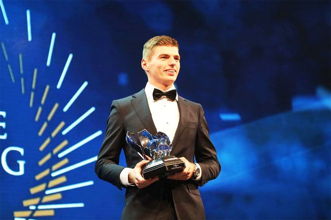 Max Verstappen with his awards at the International Automobile Federation (FIA)'s gala prize-giving ceremony on Friday