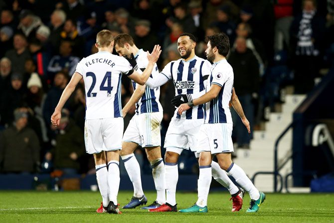 West Bromwich Albion's Matt Phillips (2nd from right) celebrates scoring his team's third goal against Watford during their EPL match at The Hawthorns in West Bromwich on Saturday