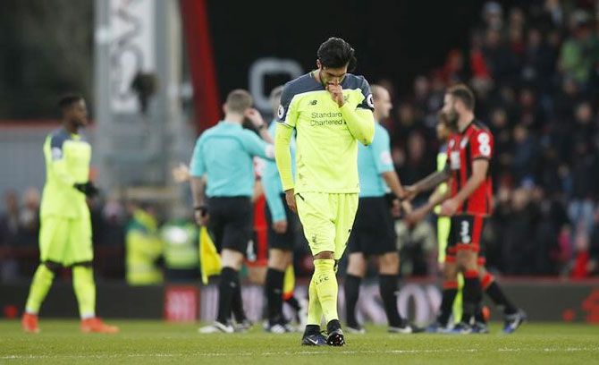 Liverpool's Emre Can is a dejected figure after the game against Bournemouth