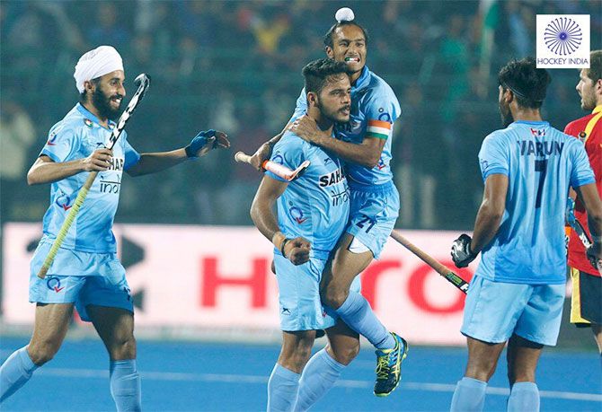 India's Junior Hockey team players celebrate after netting the winning penalty during the Jr Hockey World Cup semi-final in Lucknow on Friday