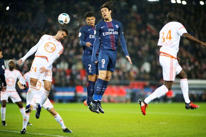 Paris St Germain's Thiago Silva (2) scores their third goal against FC Lorient during their Ligue 1 match in Parc des Princes Stadium on Wednesday