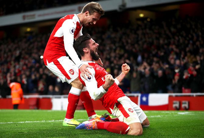 Arsenal's Olivier Giroud celebrates after scoring the opening goal against West Bromwich Albion at Emirates Stadium in London