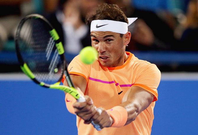 Spain's Rafael Nadal in action during his match against the Czech Republic's Tomas Berdych on Day 1 of the Mubadala World Tennis Championship at Zayed Sport City in Abu Dhabi on Thursday