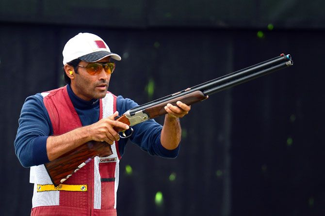 Qatar's Nasser Al-Attiya competes in the Men's Skeet Shooting qualification round at the London 2012 Olympic Games