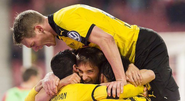 Borussia Dortmund players celebrate victory against VFB Stuttgart in their German Cup quarters on Tuesday
