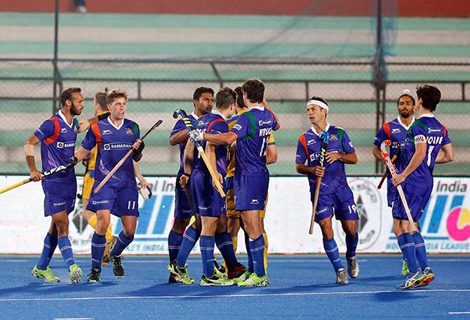 UP Wizards celebrate a goal against Jaypee Punjab Warriors 