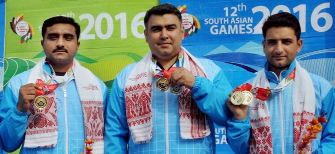 Gold medal winner Chain Singh, with compatriots Gagan Narang and Surendra Singh Rathore 
