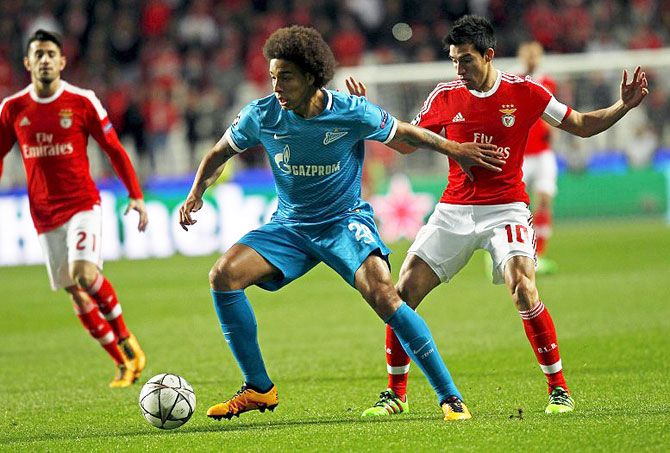 Benfica's Nicolas Gaitan (right) is challenged by Zenit St. Petersburg's Axel Witsel